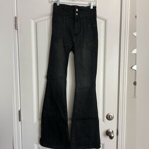 Free people, black boot cut jeans.